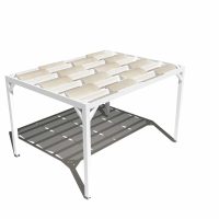 Pergola autoportante blanche avec voilage beige et ombres projetées sur le sol